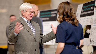 USU Student presents their research to a USU Professor